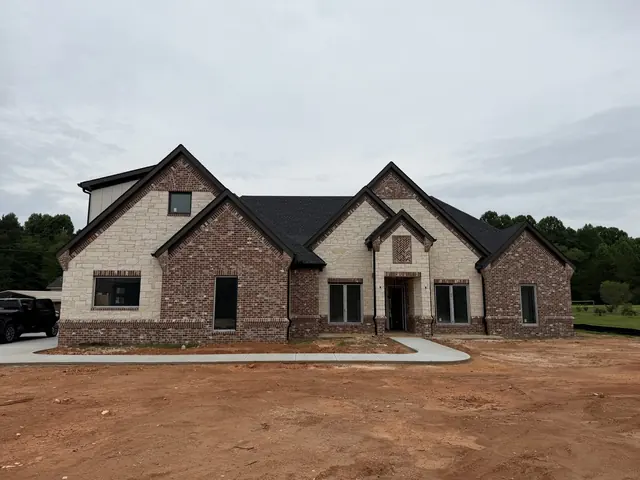 Finished brick and stone front of Project 1632